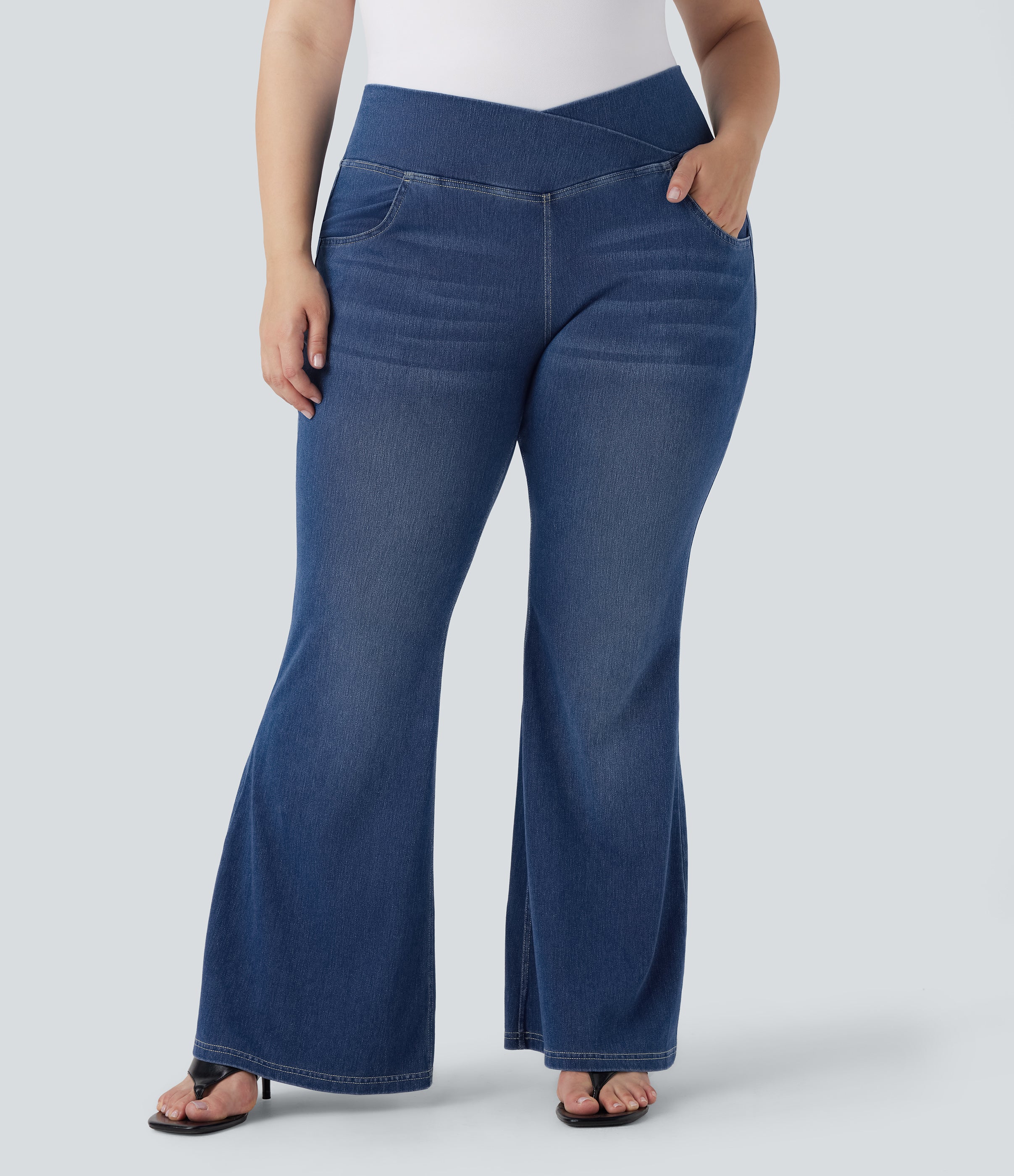 Plus Size FlexTM High Waisted Crossover Washed Casual Flare Jeans with Pockets