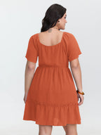Shirred Bodice Ruffle Hem Flowy Mini Dress
