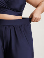 High Waisted Pockets Solid Pleated Swim Shorts