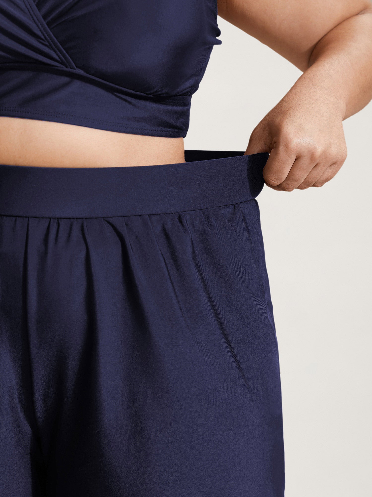 High Waisted Pockets Solid Pleated Swim Shorts