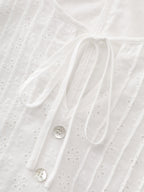 Cotton Eyelet Trim Neck-Tie Pleated Mini Dress